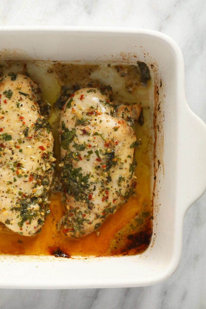 Want to learn how to bake chicken breast? Read this guide to perfect baked chicken every time + get 6 chicken breast marinades to flavor your chicken with. Italian chicken baking in baking dish