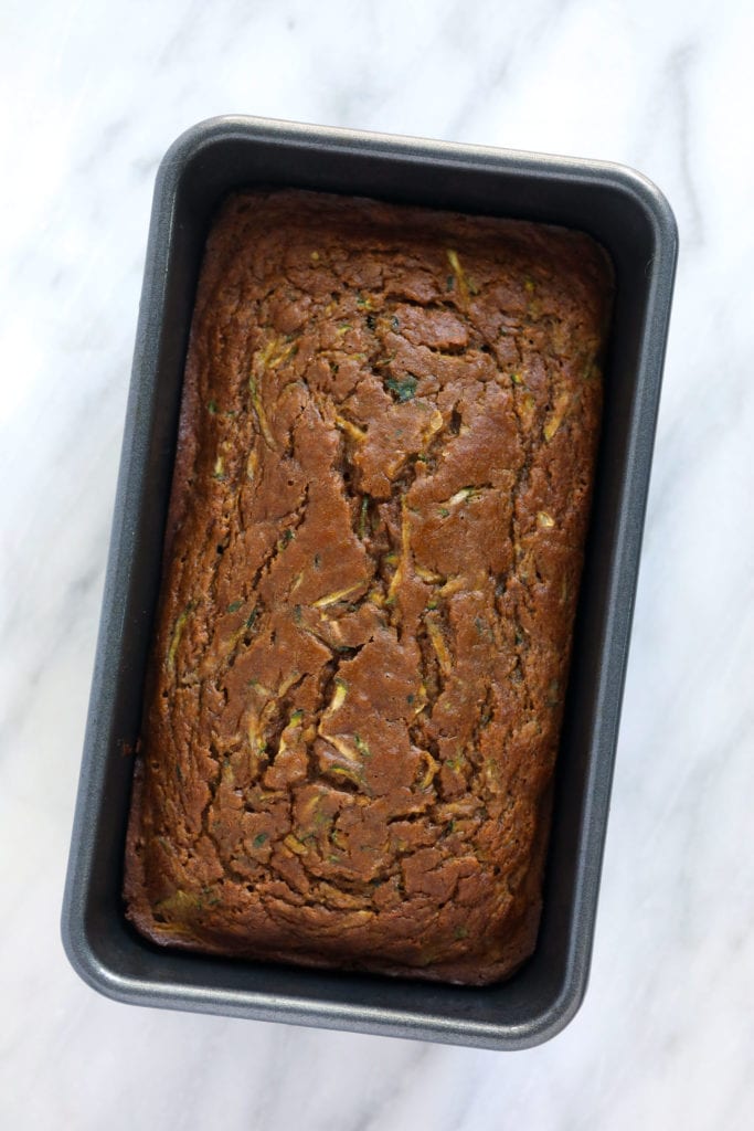 Zucchini bread in a loaf pan.