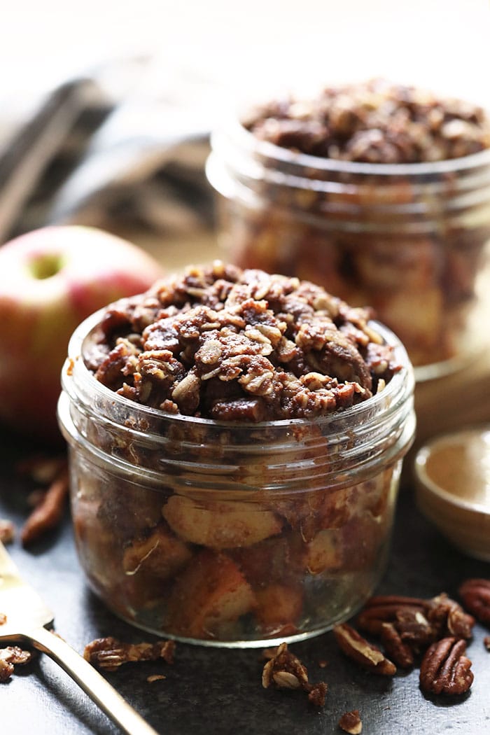 No stove? No problem. This Instant Pot Apple Crisp is made completely in the Instant Pot. All of your favorite fall flavors and spices in one delicious dessert with a drool-worthy crunchy crisp topping. Make this healthy dessert for a treat this week! Finished Instant Pot Apple Crisp in a mason jar
