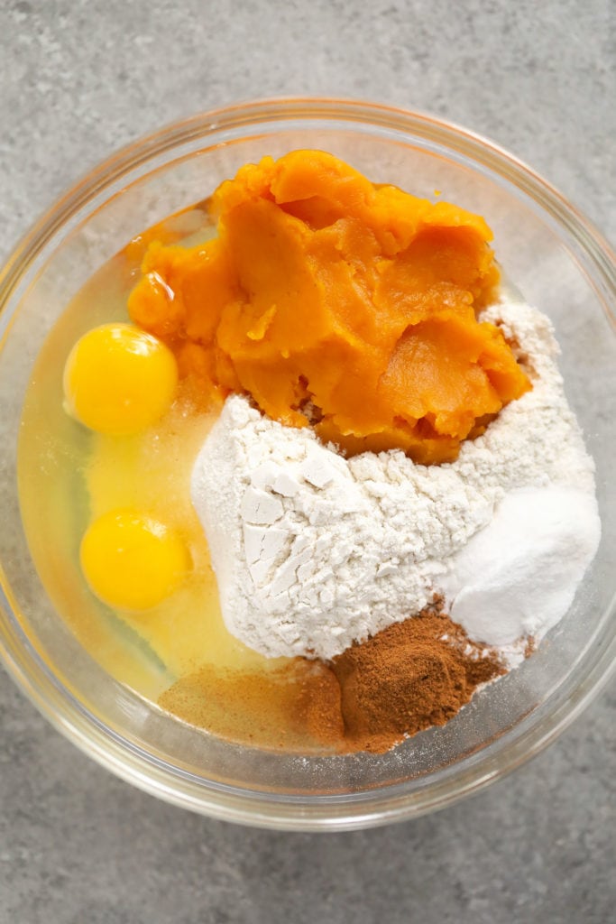 Got pumpkin? Make this delicious pumpkin gluten free waffles recipe! It's made with simple ingredients and pumpkin pie spice. waffle batter in bowl