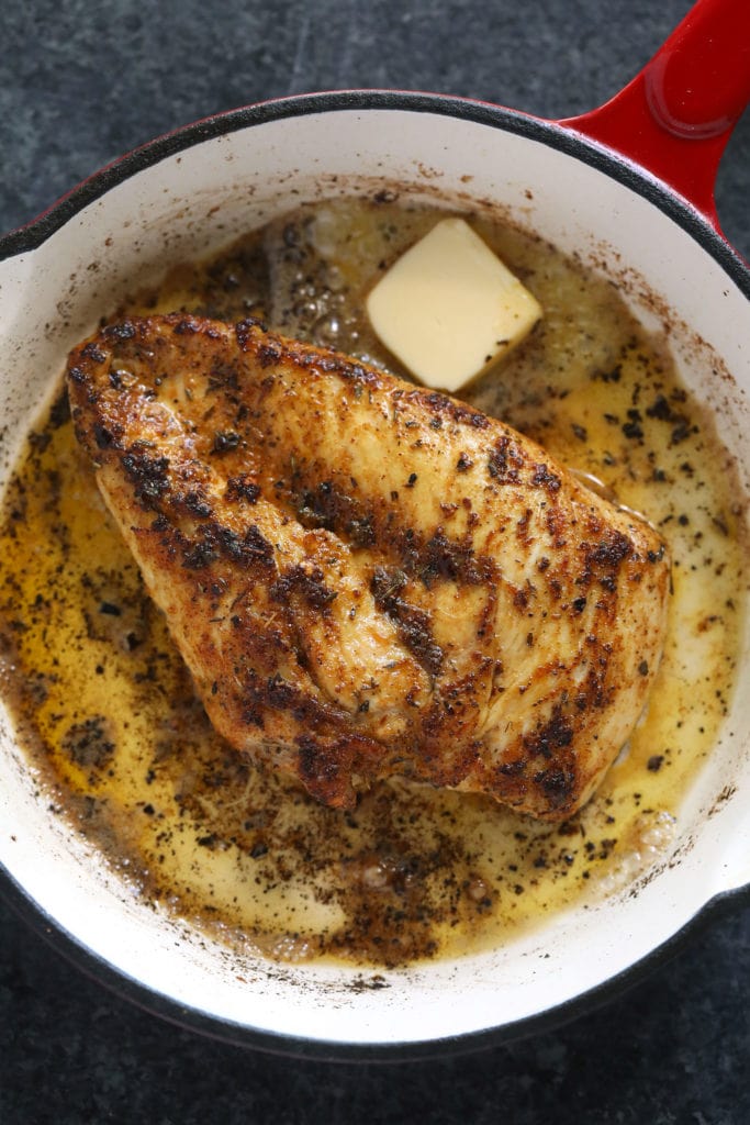 Make this flavorful stovetop chicken breast recipe and pair it with your favorite veggie and grain to complete your meal! fried chicken breast in pan