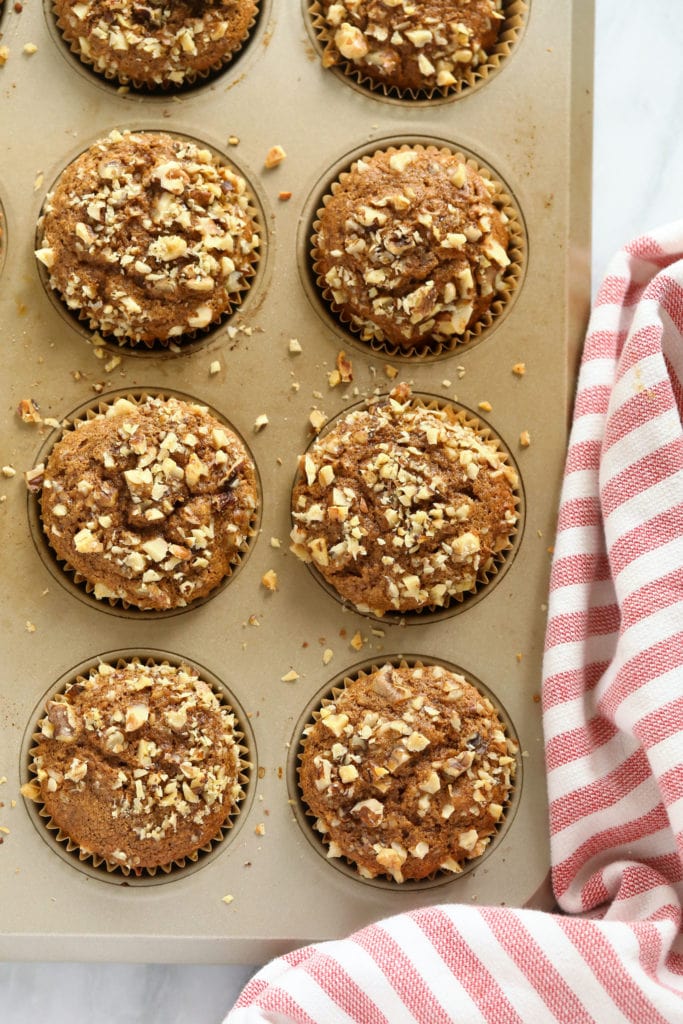 Banana nut muffins in a muffin tin.