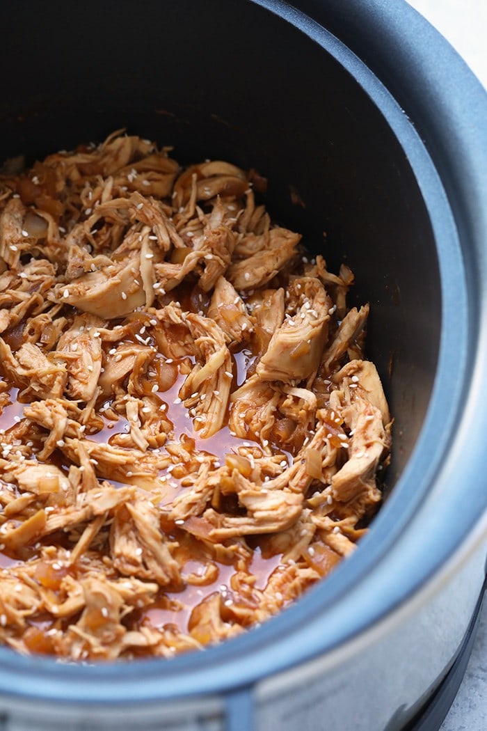 Throw all of the ingredients for this Healthy Crockpot Sesame Chicken recipe into your slow cooker and have dinner ready in no time. This healthy crockpot chicken recipe is kid-friendly, gluten-free friendly, and an excellent meal prep chicken recipe. sesame chicken in slow cooker