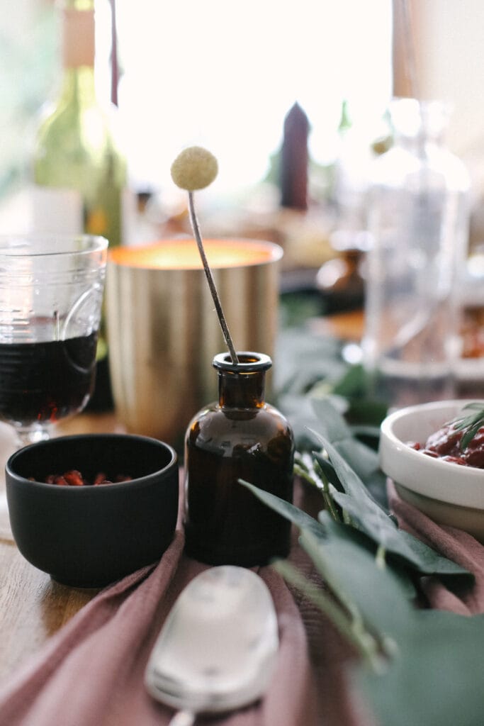 We have been obsessed with small decorative vases that we can put dried flowers in. These really fill any hole on your thanksgiving table and are so pretty! small vase with flower