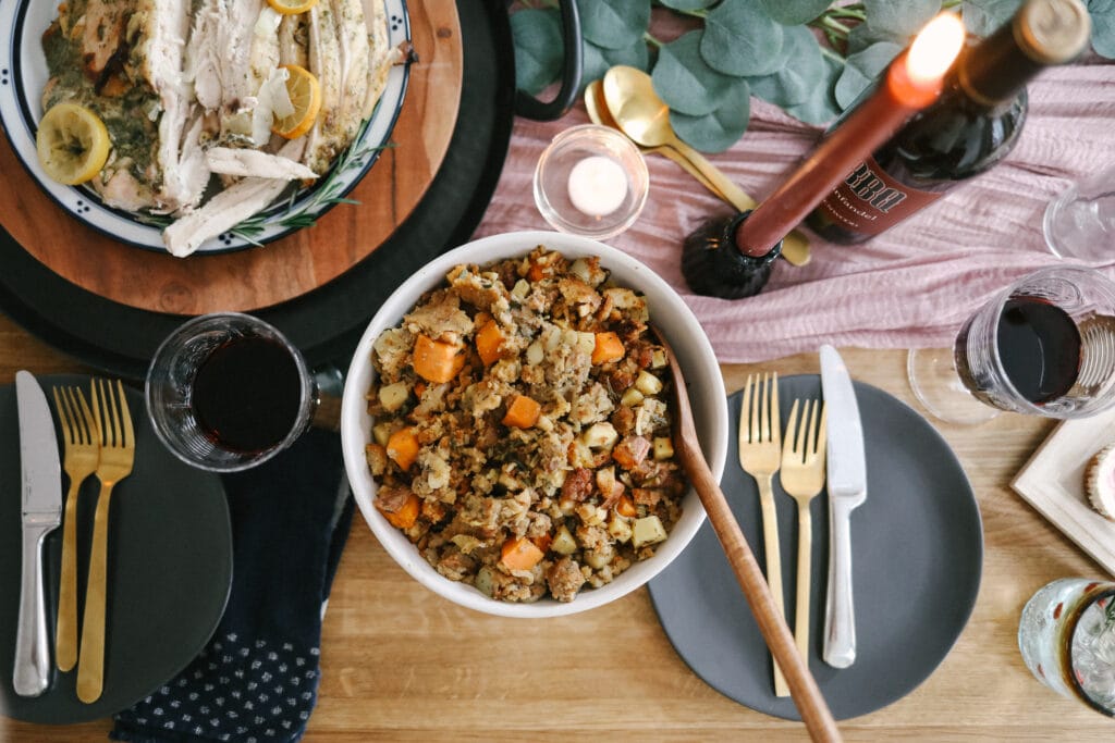 This Incredible Sausage Stuffing is as easy as it is delicious! The perfect complement to your holiday meal, this stuffing features store-bought stuffing cubes, which means you won’t have to dry out your own bread. stuffing in bowl