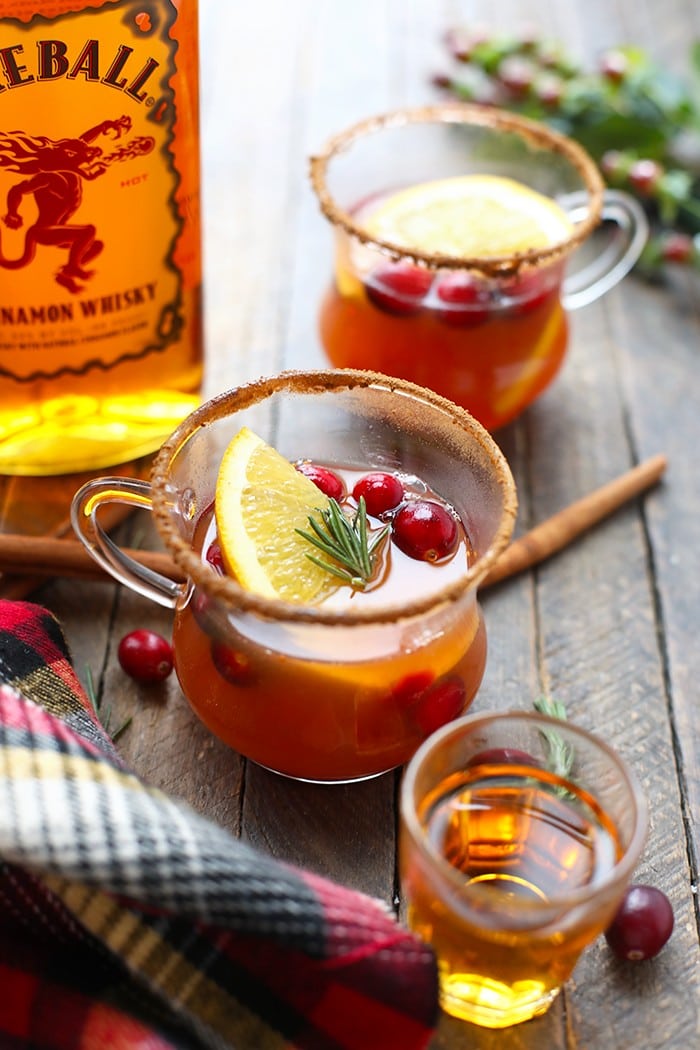 Warm your soul with this homemade hot toddy recipe! This adult beverage mixes the hot toddy ingredients of cinnamon whiskey, apple cider, and citrus for a delicious winter drink. It is the perfect winter cocktail for any occasion! A cup of hot toddy