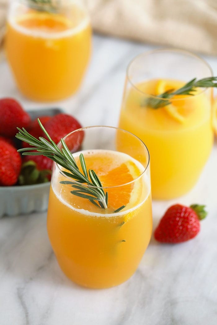 Take your brunch drink up a notch and make a beermosa! Forget the champagne and add mix your favorite beer with some orange juice for the perfect brunch cocktail this holiday season! Beermosa in a glass
