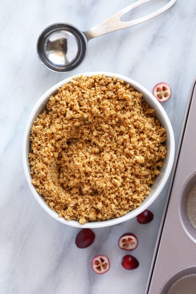 A bowl of graham cracker crumble before it's made into crush.