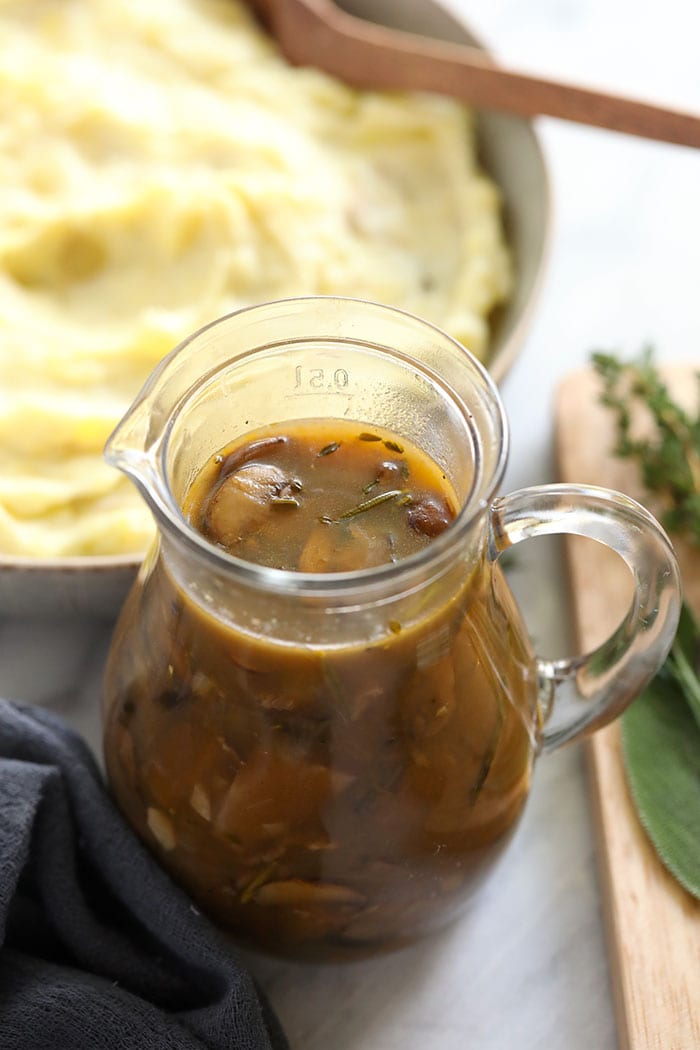 This vegetarian mushroom gravy is flavorful, easy to make, and perfect for any meal! You don't have to sacrifice gravy if you don't eat meat, this vegetarian mushroom gravy will do the trick! Mushroom gravy in a pour jar