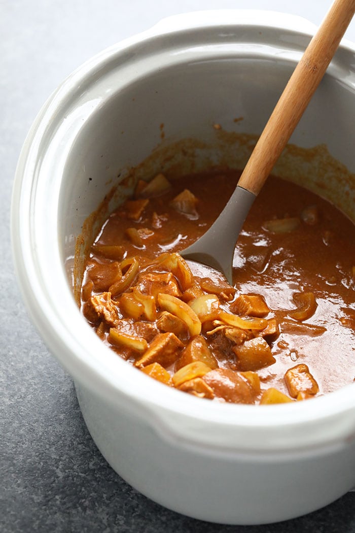 This Healthy Slow Cooker Chicken Tikka Masala is savory, hearty and made completely in the slow cooker. Prep a batch and you'll have dinner in no time, or meal prep and freeze for the perfect freezer meal at a later date. Healthy slow cooker meals have never been easier! slow cooker chicken tikka masala