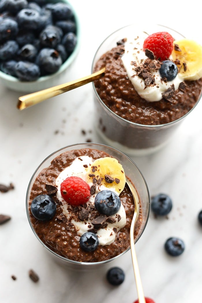 Looking for a dairy-free dessert that the whole family will love? Whip up this easy Chocolate Chia Seed Pudding Recipe with just a few clean ingredients and no refined sugar. Enjoy! chocolate chia seed pudding in a cup