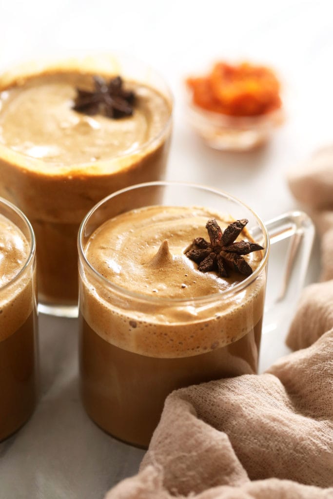 Hot dalgona coffee in mugs.