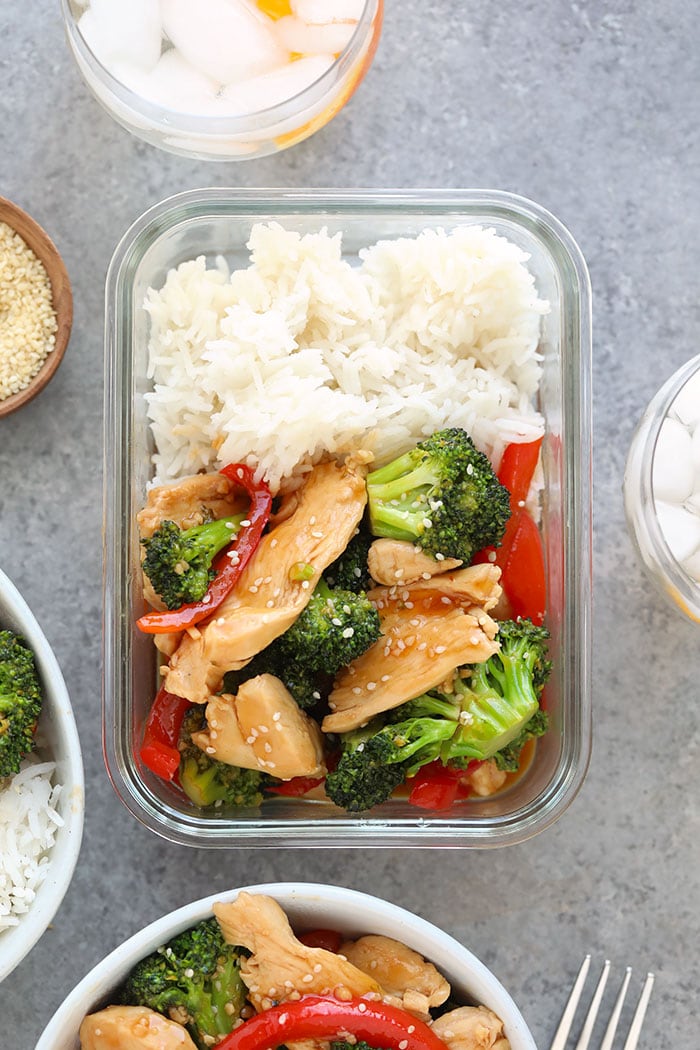 Chicken and broccoli stir fry in a meal prep container.