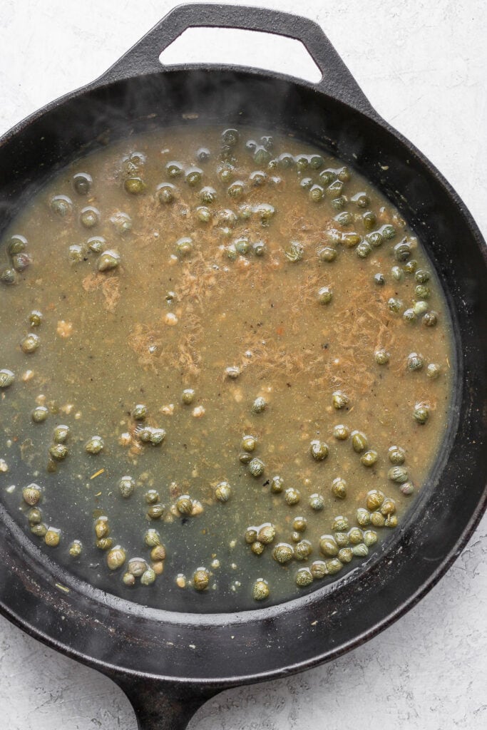 White wine sauce in a cast iron.