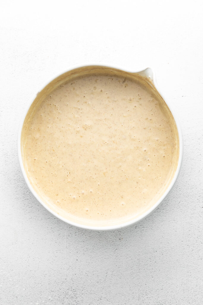 This banana pancake recipe is the ultimate weekend breakfast. Why? These banana pancakes come out super fluffy and they taste heavenly topped with fresh banana and warm maple syrup. pancakes batter