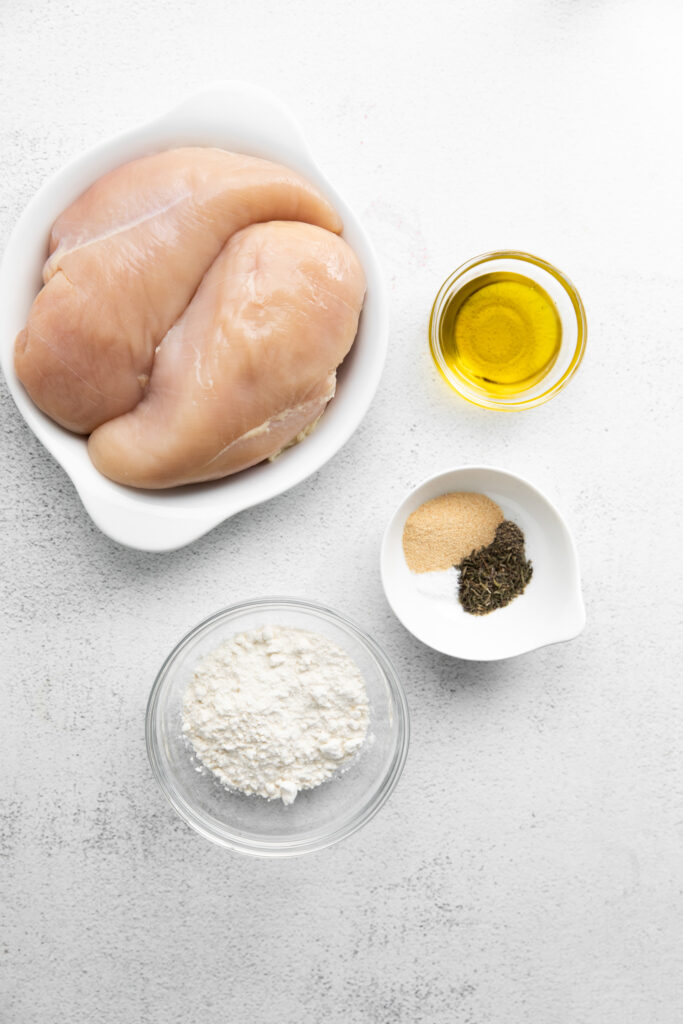 Homemade Chicken Alfredo is so much easier to make than you may think. In this post, we'll teach you how to make chicken Alfredo in less than 45 minutes! chicken, spices, and flour