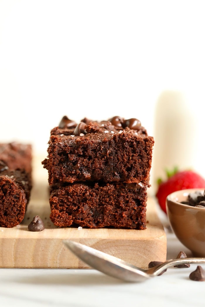 We made you the Fudgiest Paleo Brownies of your dreams! Made with a combination of coconut flour and almond flour, these healthy brownies taste like the real deal, but are actually grain-free, dairy-free, and gluten-free! 2 paleo brownies