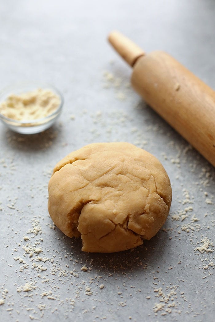These healthy gluten free cookies are made with almond meal and honey for a grain-free, paleo-friendly sugar cookie! Make a batch today! Sugar cookie dough