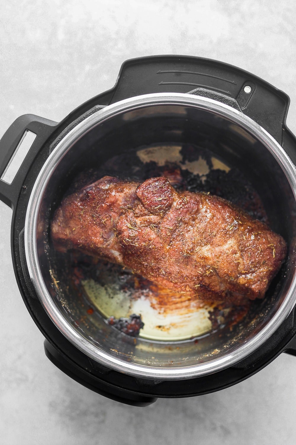 The most tender and juicy Instant Pot Pulled Pork made with a delicious dry rub and your favorite bbq sauce! searing pork roast in instant pot