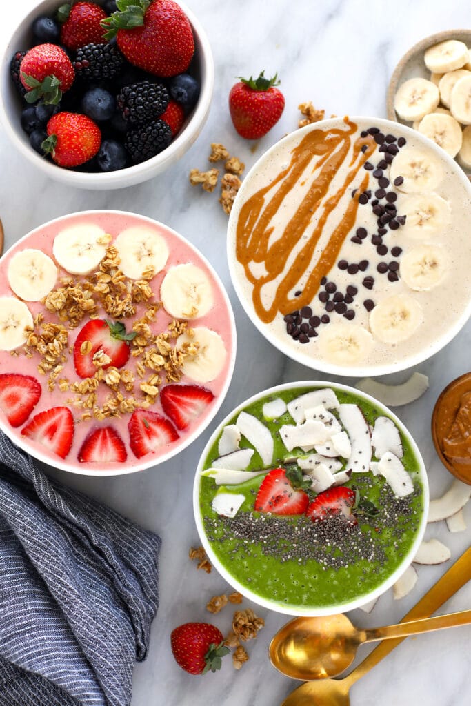 Rise and shine with a delicious Smoothie Bowl recipe! Smoothie bowls are a great breakfast idea that pack in nutrients, fruit, and veggies. 3 smoothie bowls with toppings