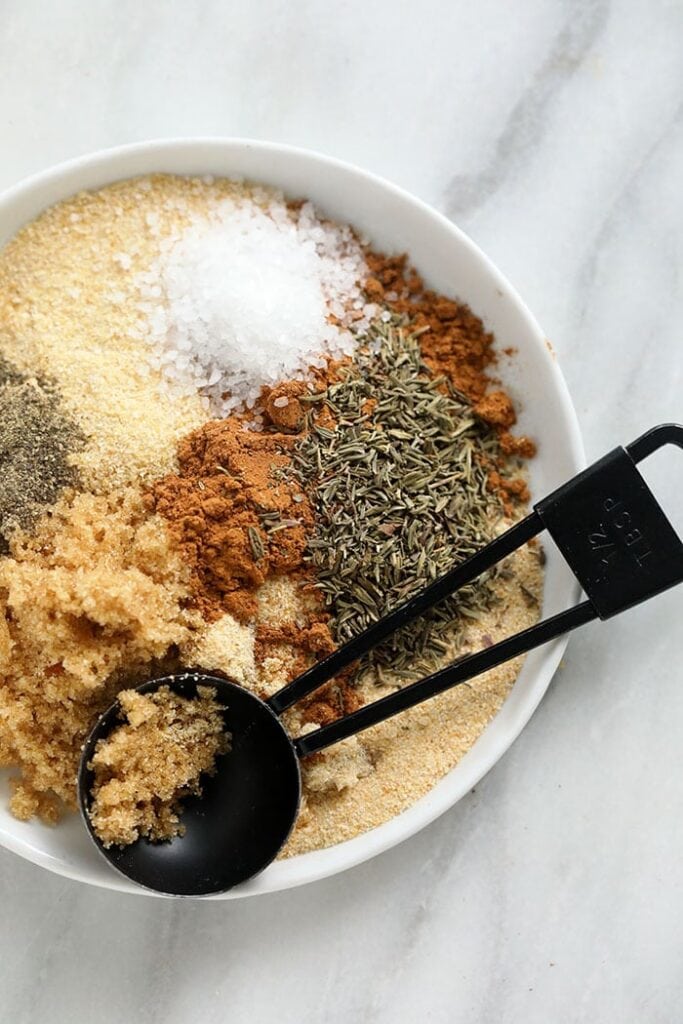 This 7-ingredient Pork Rub recipe will quickly become your go-to pork dry rub. Whether you’re making chops, ribs, loins or a roast, you’ll love this savory and sweet dry rub. Mix up a batch today! pork rub in bowl