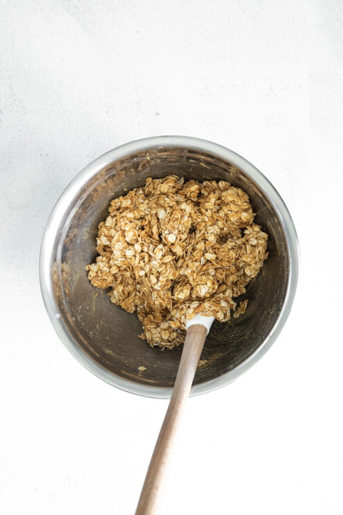 These soft and chewy peanut butter oatmeal cookies are the only cookies you'll ever want to eat again! oatmeal cookie batter in bowl