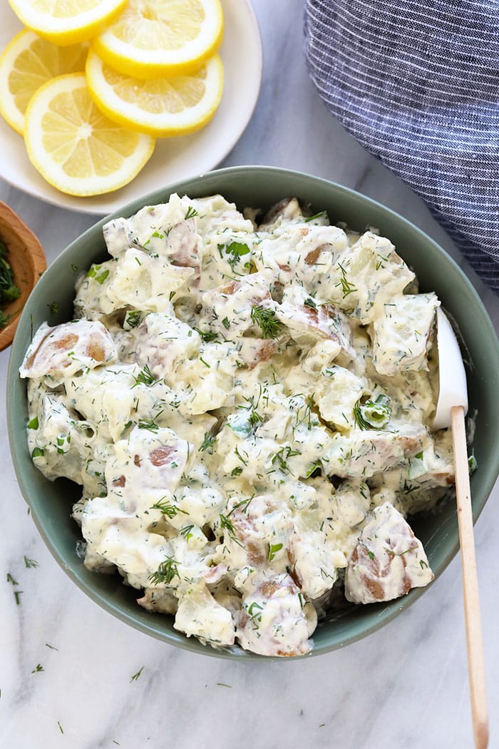 This vegan potato salad is light, bright, and delicious! Not only is this potato salad the perfect summer side, but it's also so easy to make. A bowl of vegan potato salad