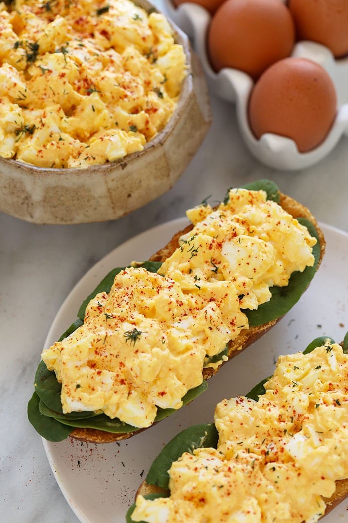 This healthy egg salad comes together with just 6 ingredients. It's a high-protein, low-carb salad that's enjoyable any day of the week. healthy egg salad sandwiches