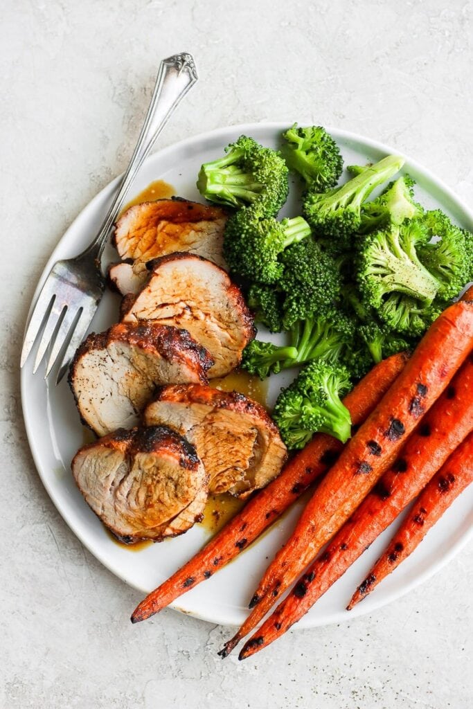 Say hello to this juicy grilled pork tenderloin! Rubbed with a delicious spice blend and then soaked in a grilled pork tenderloin marinade, this piece of pork is charred to perfection. pork tenderloin