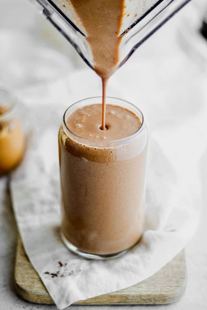 Start your day off right with this Peanut Butter Banana Cold Brew Protein Smoothie! If you love the peanut butter banana combination with an added boost of protein, then you will love this healthy breakfast smoothie or snack smoothie. Add your favorite scoop of protein to this smoothie and you are set for the day. I bet you have all the ingredients in your kitchen, right now! protein shake
