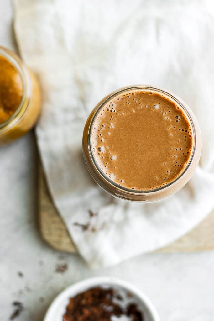 You will absolutely love this coffee protein shake recipe. It's not your average protein shake because it's made with cold brew coffee, peanut butter, and banana - the ultimate flavor combo! protein smoothie