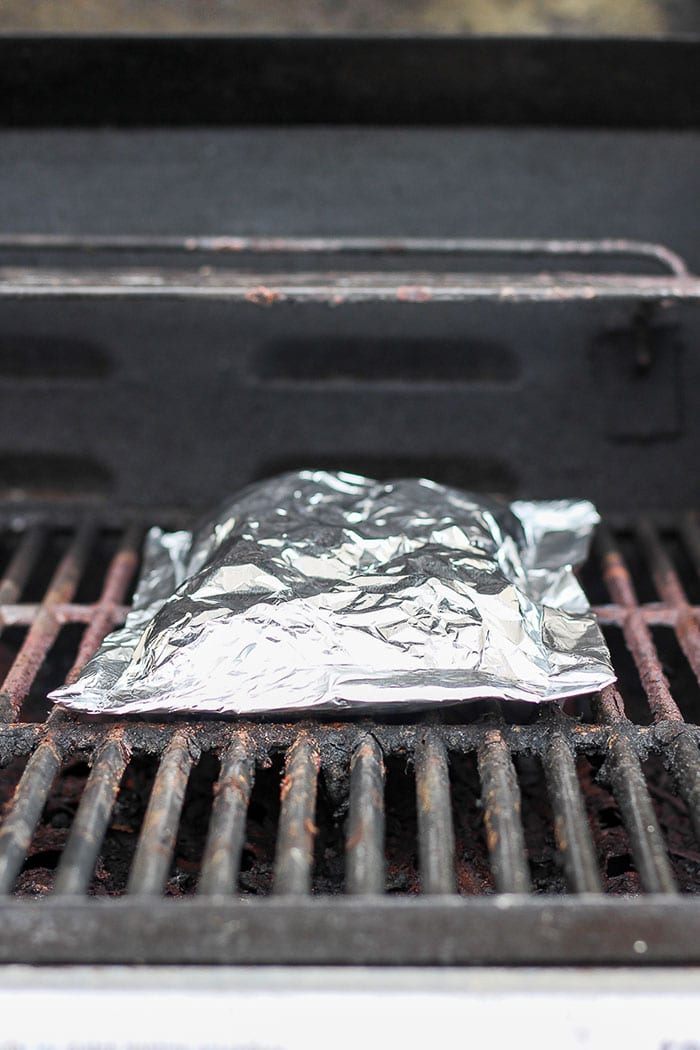 These foil pack grilled red potatoes are an easy side to add to any bbq. All you need to do to make these grilled potatoes in foil is toss them in olive oil, spices, and create foil pack! foil pack of potatoes on grill