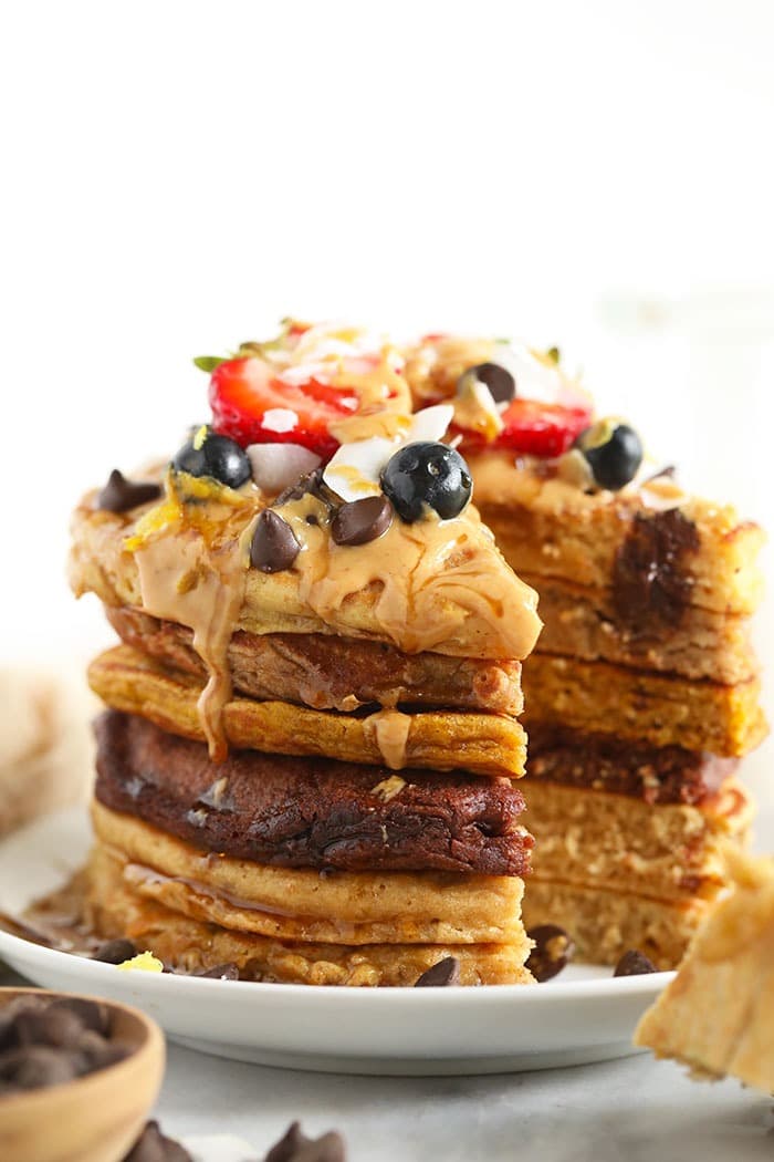 a stack of pancakes with topings!