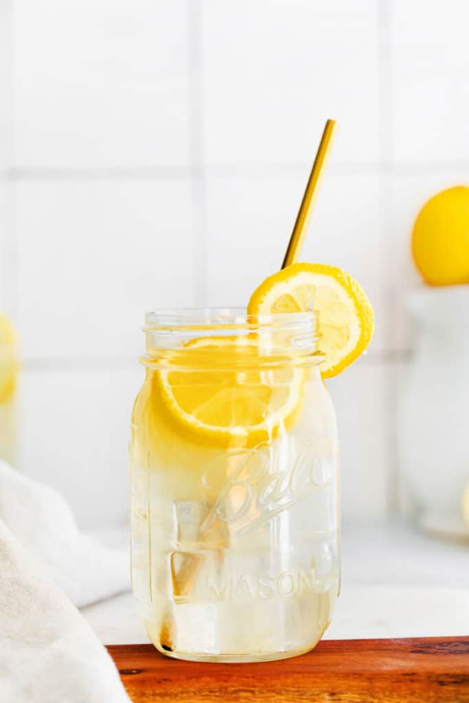 A mason jar full of lemonade.