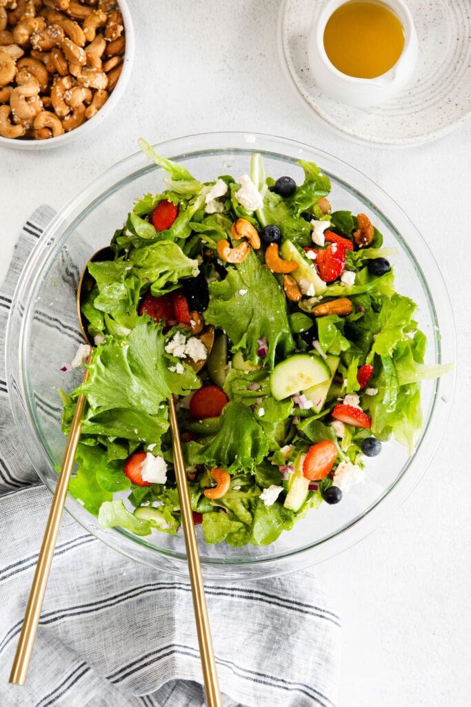 Spring mix salad in a salad bowl.