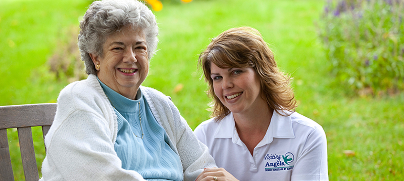 Two women sitting together