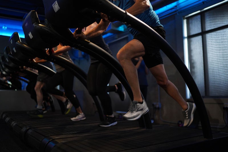 Stride Gym - People on stair machines.