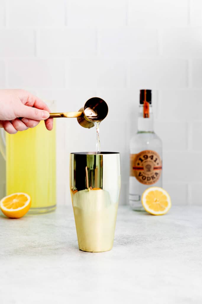 Vodka lemonade is the perfect easy cocktail to make any time of year. It's made with minimal ingredients and the perfect combo of sweet and sour. adding vodka into cocktail shaker