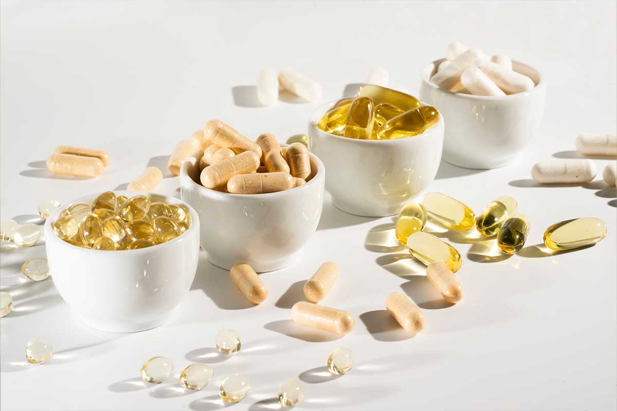 A bowl of supplements and vitamins