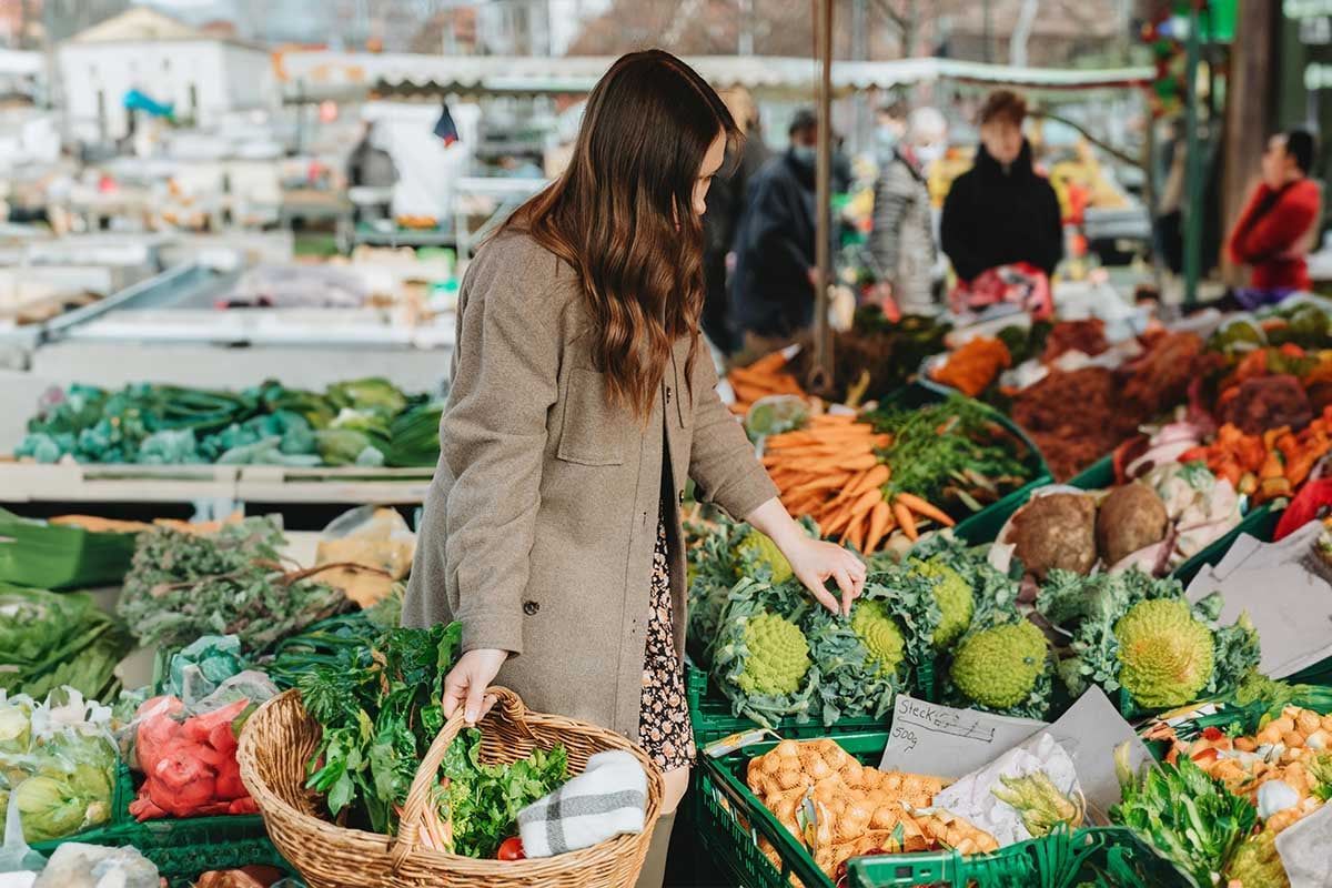 A woman shopping at a farmer market